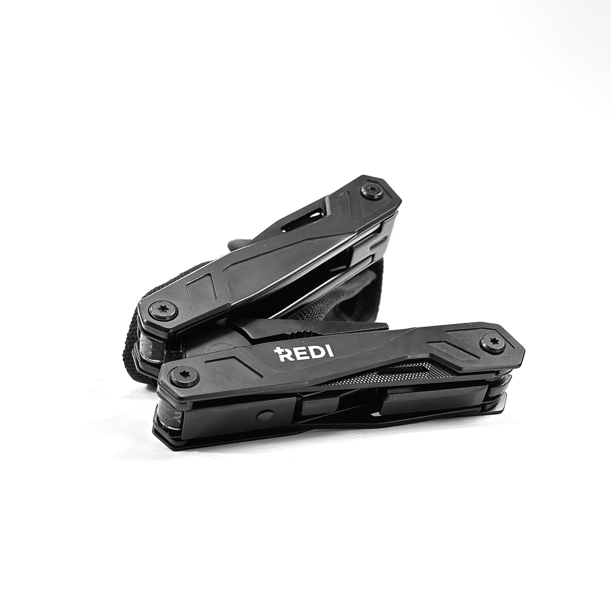 REDI 21-in-1 multi-tool folded closed with self-locking black handles, on its carry case