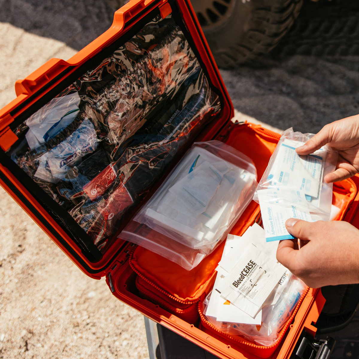 The Roadie PRO IP67 waterproof, crushproof orange case with double throw-latches and rubber handle